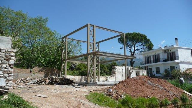 Steel frame with cross bracing of the two-story house in Patras