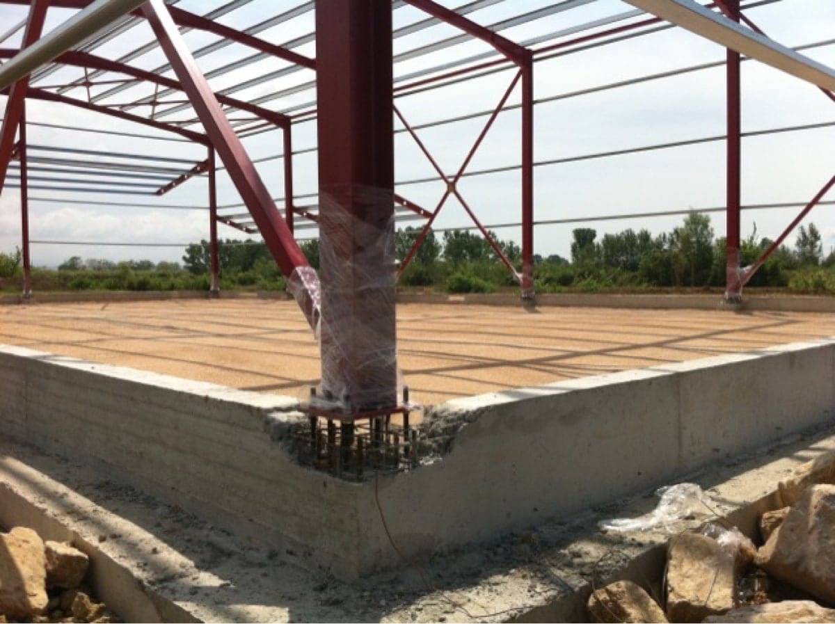 the anchor bolts before the slab on grade is poured