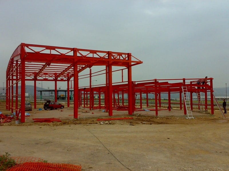 Steel frame with curved roof trusses of the vehicle inspection center in Aspropyrgos