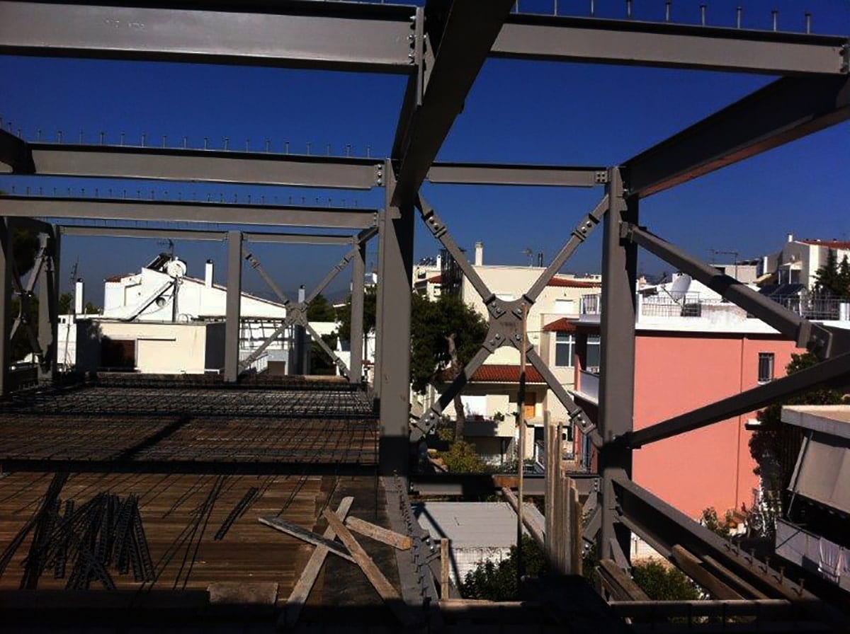 Composite slab reinforcement and cross bracing in the frame of the extension in Melissia