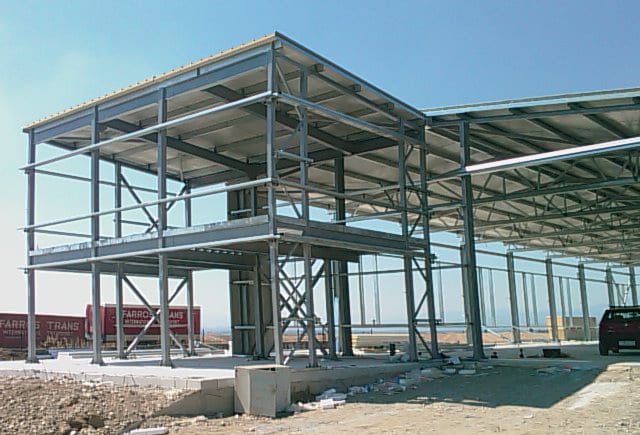 Steel frame with mezzanine and roof panels nearing completion in Grevena