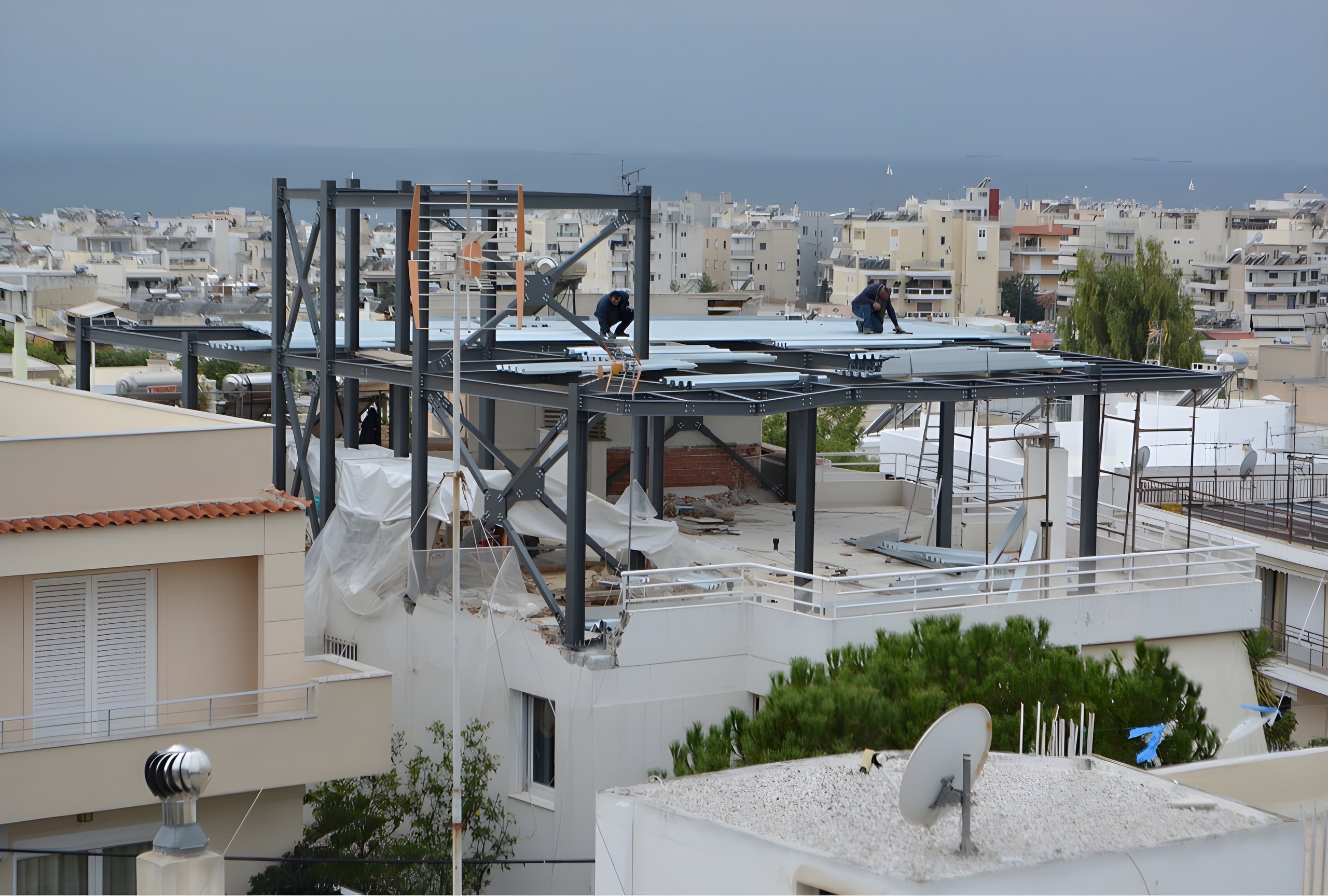 Two-story vertical addition in Alimos