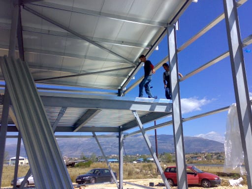 Workers on the steel deck of the workshop mezzanine in Bafra, Ioannina