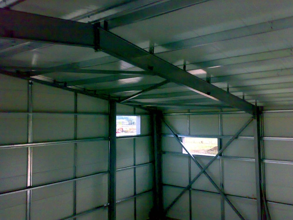 Interior of the workshop in Bafra, Ioannina, seen from the mezzanine, with frame and panels