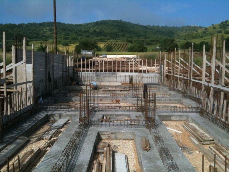Basement foundation with rebar and formwork at the workshop building in Eleousa