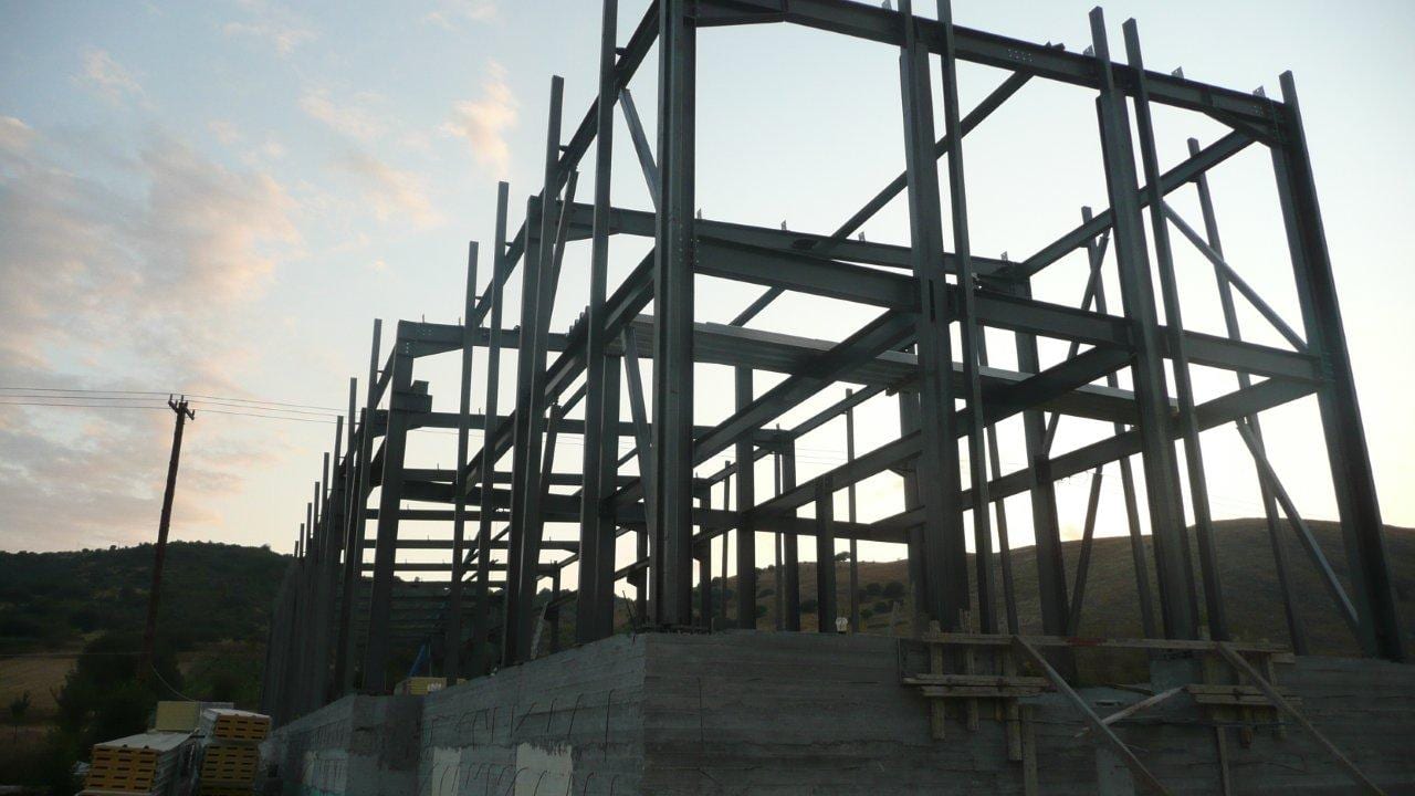 The steel frame of the workshop building in Eleousa nearing completion