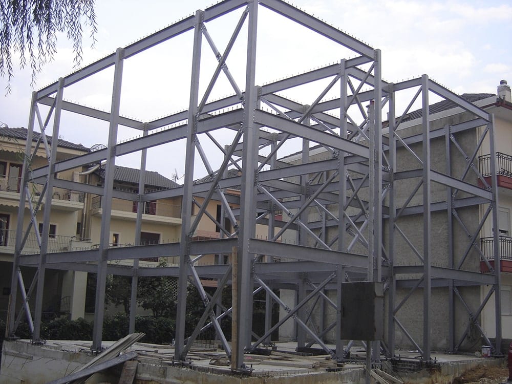 Steel frame of the guesthouse in Ioannina with cross bracing