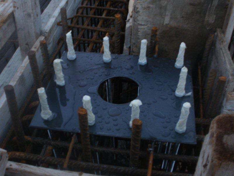 Base plate with anchor bolts within the foundation rebar at Lithos Villas, Kefalonia