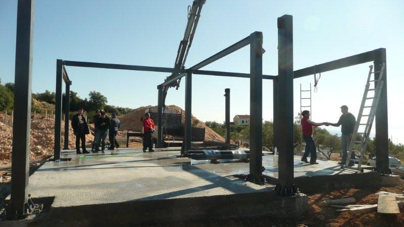 Steel frame erection in progress at Lithos Villas in Vlachata, Kefalonia