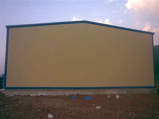 Rear elevation of the agricultural storage building with panels in Kaisari, Corinthia