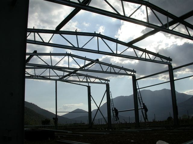 Erection of the steel frame with lattice trusses at the agricultural storage building in Kaisari, Corinthia