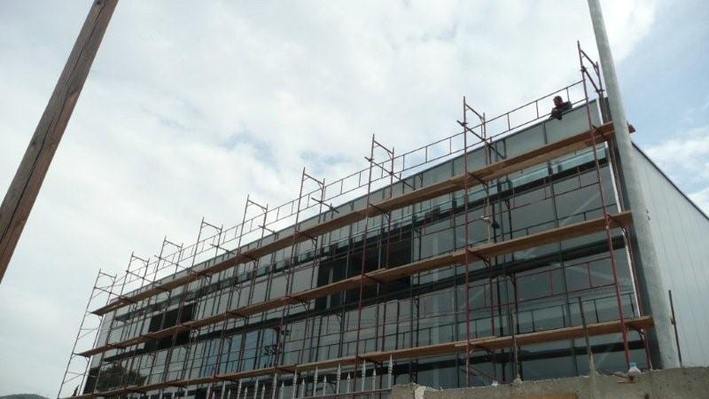 Scaffolding on the front during installation of the facade in Aspropyrgos, Attica