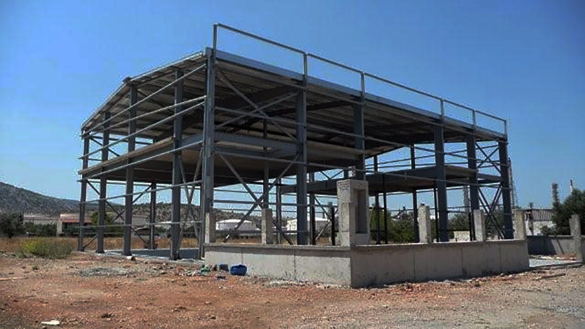 Completed two-story frame with concrete slabs in the aluminum fabrication building in Aspropyrgos