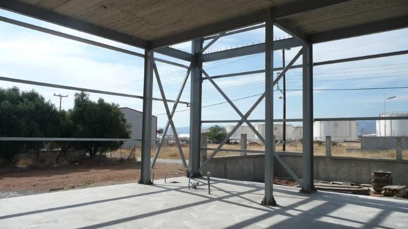 Ground floor with steel columns and cross bracing in the building in Aspropyrgos, Attica