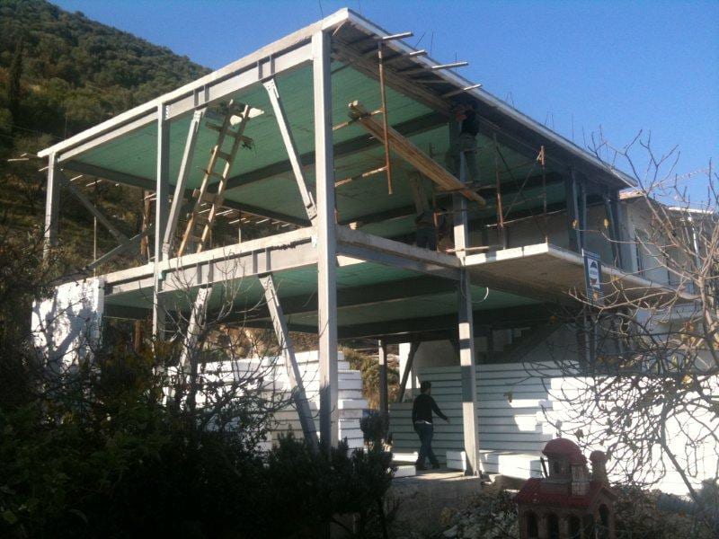 Completed frame with the floor slabs at the bakery workshop in Vlychos, Lefkada