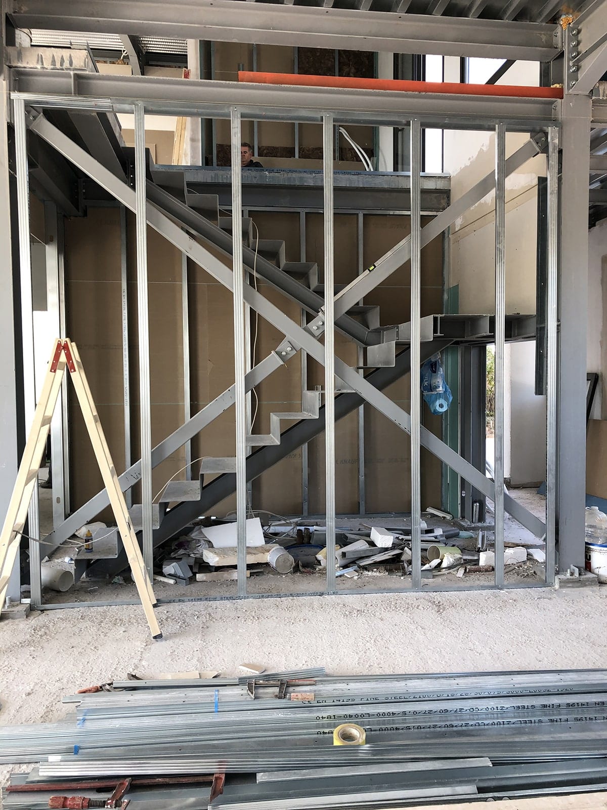 Steel stair and drywall framing inside the maisonette in Varympompi