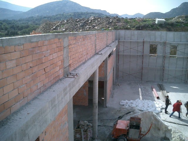 Brick masonry in progress at the carpentry workshop in Filoti, Naxos