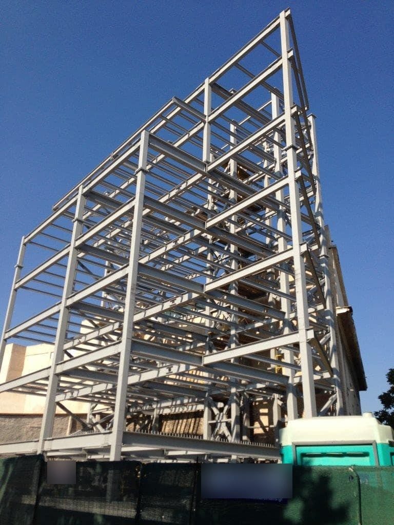 Multi-story steel frame nearing completion on the Neuropublic project