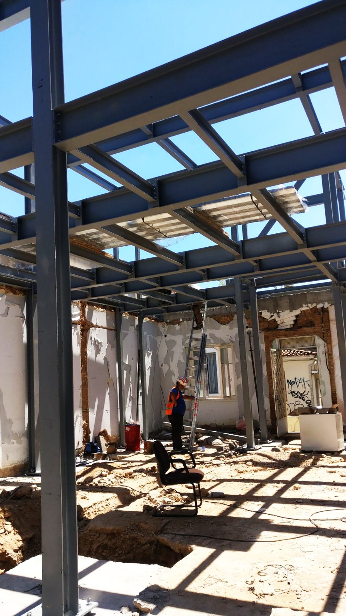 Ground-floor steel frame inside the existing building in Ano Petralona