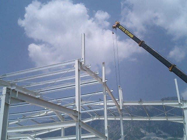 Erection of the steel frame with a crane at the distillery in Paramythia, Thesprotia