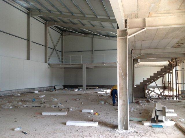 Interior of the workshop in the industrial park of Paramythia with insulated panels, mezzanine and stairs