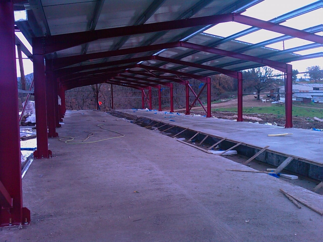 Interior of the cattle barn in Selefkeia with steel frames and roofing