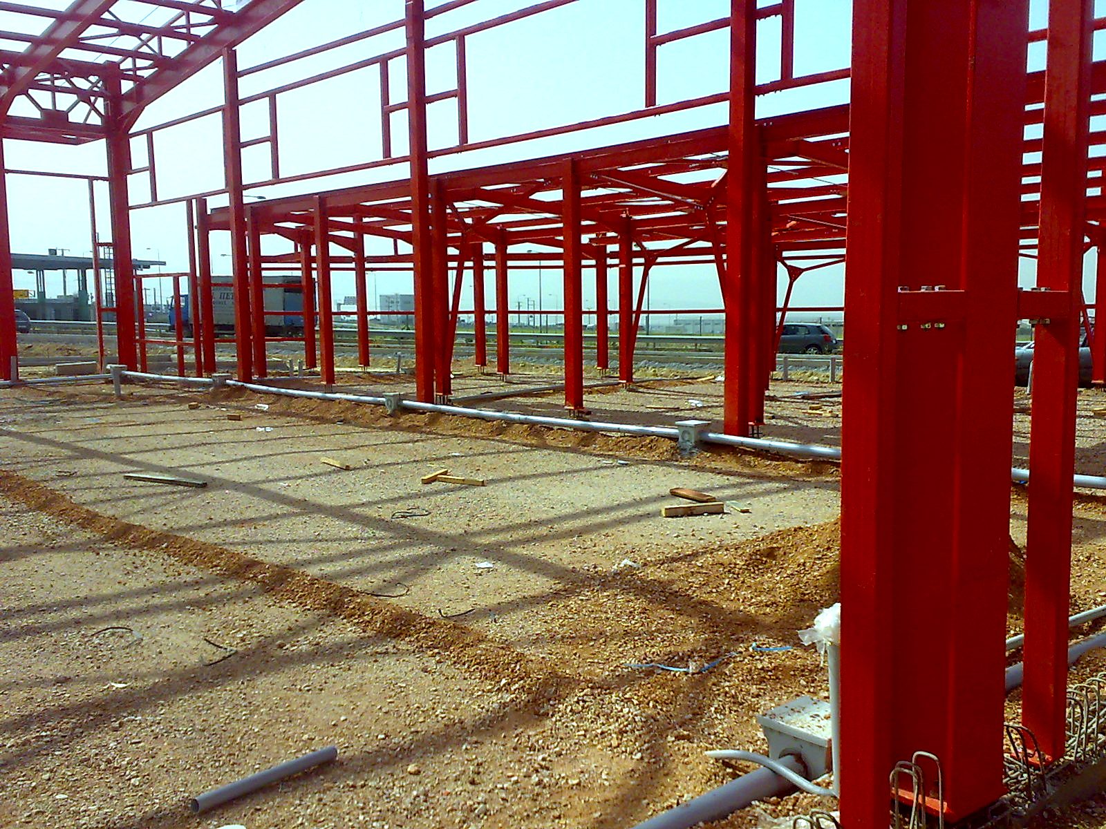 Erected steel frame with purlins and frames of a vehicle inspection center building in Aspropyrgos, Attica