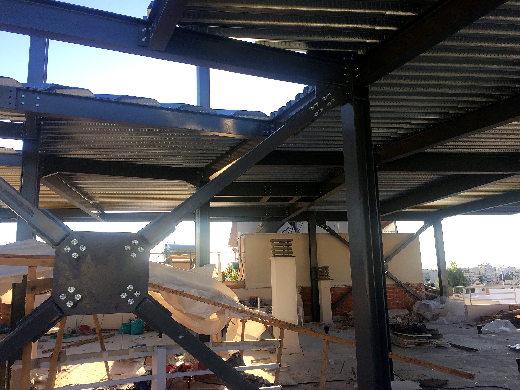 Bolted bracing connection in a steel vertical addition in Alimos, Attica