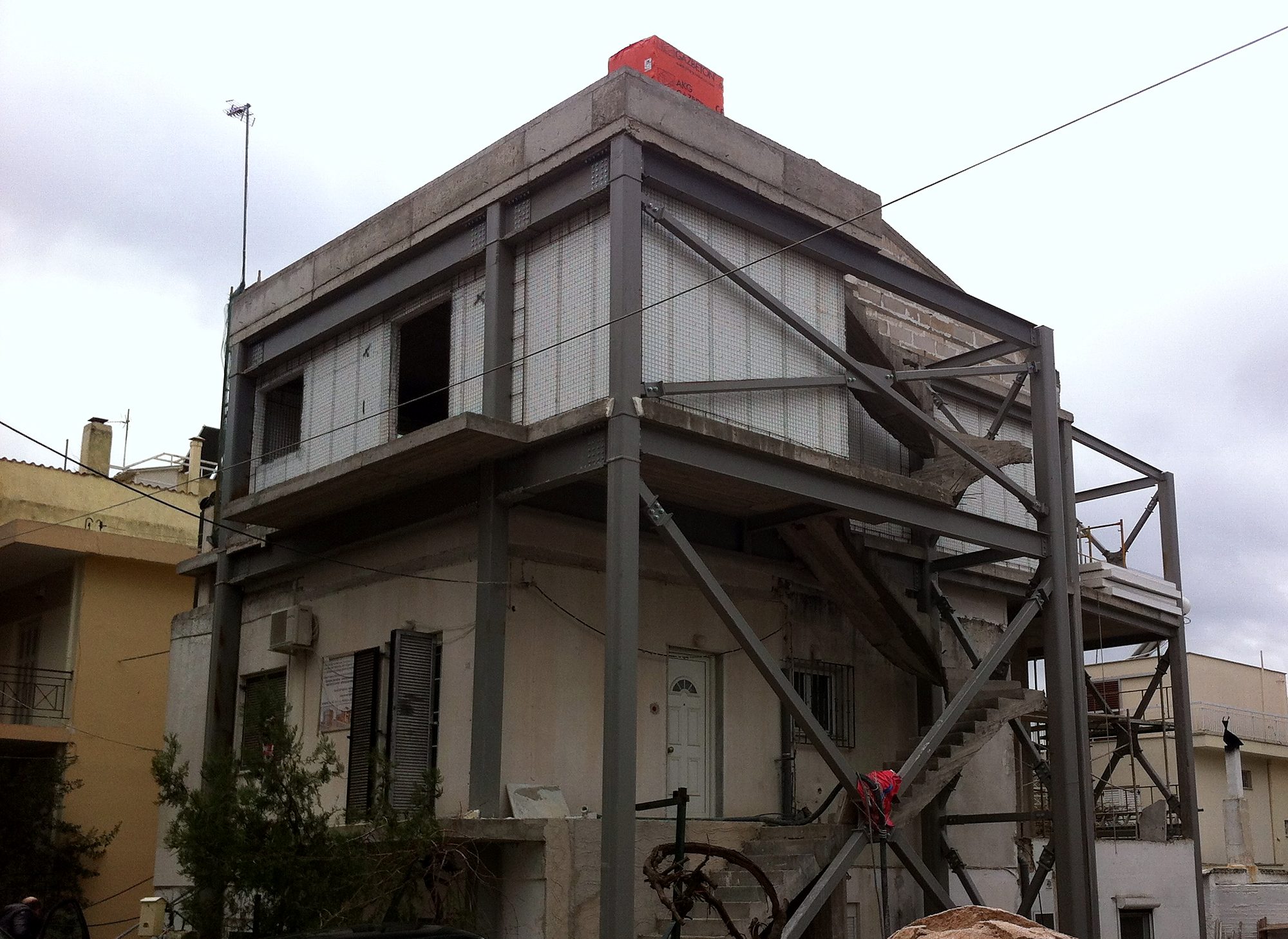 House extension with a steel frame, walls and exposed bracing in Melissia, Attica