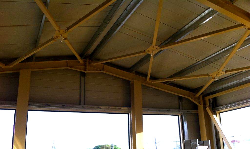 Diagonal bracing and roof frame connections inside a steel building in Marathon, Attica