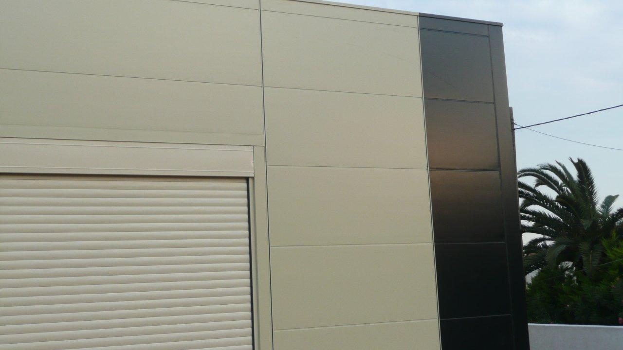 Detail at the industrial roller door, electrical supplies showroom and store in Marathon, Attica - Dimitrios Paschalidis