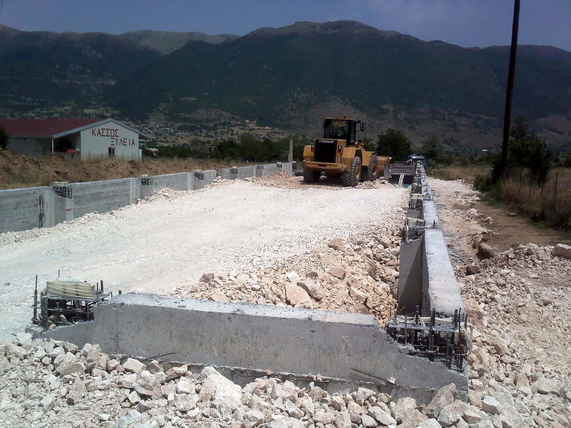 Column anchor bolt groups on the foundation strip footings of a workshop building in Eleousa, Ioannina