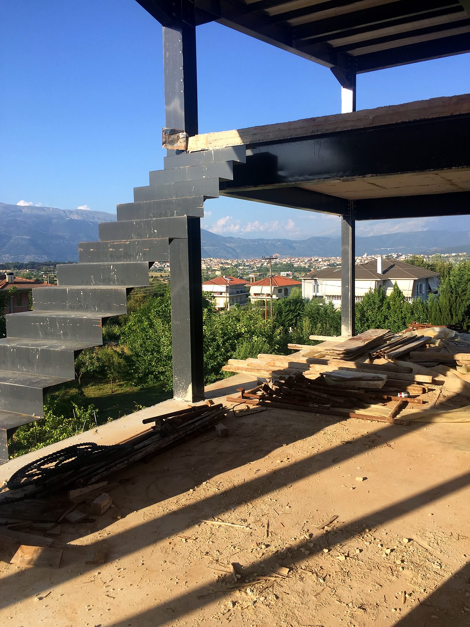 Steel stair and composite slab beams at the pilotis of a steel-frame house, Neochoropoulo, Ioannina
