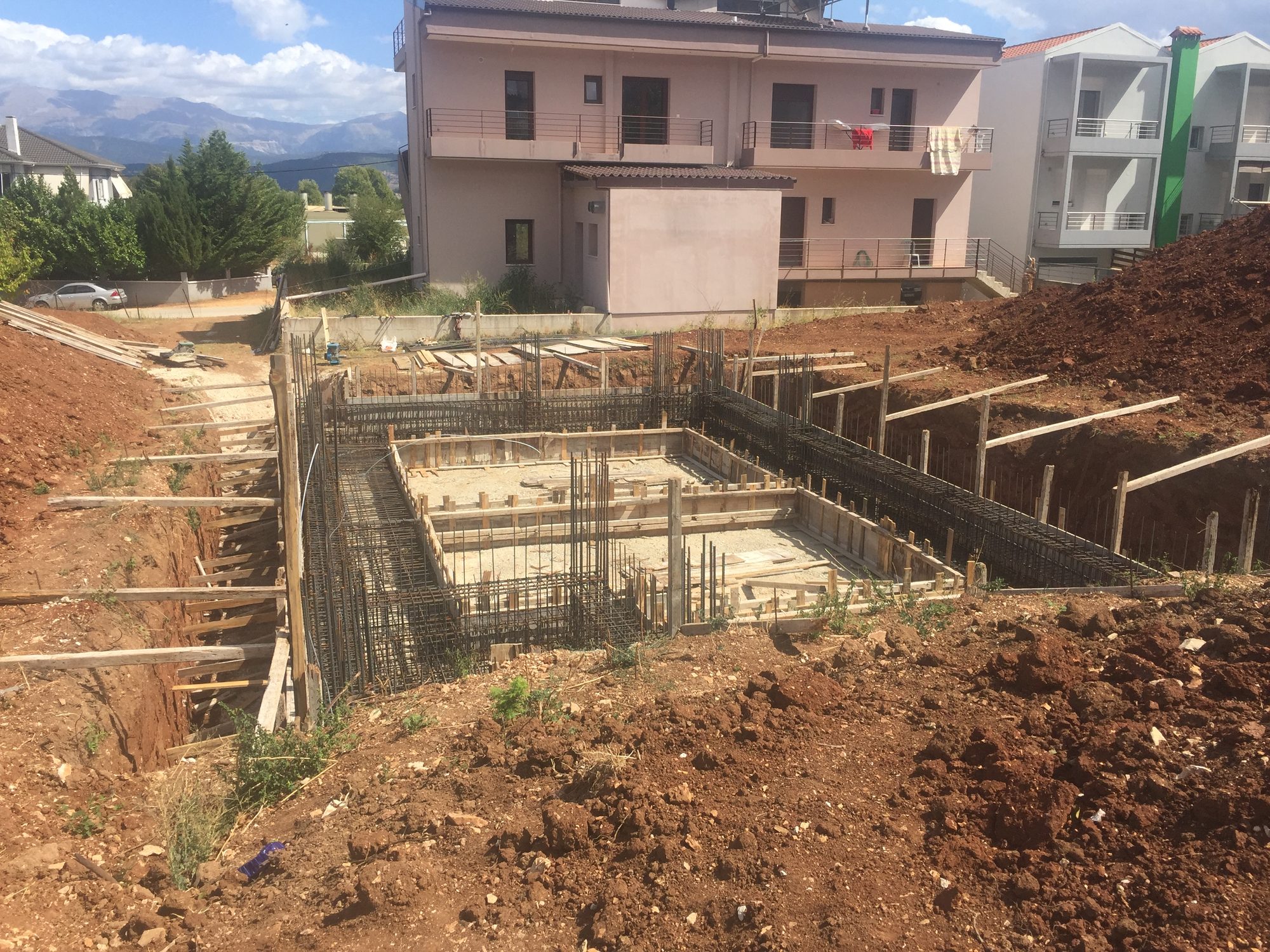 Foundation stage, House with basement, pilotis and attic in Neochoropoulo, Ioannina