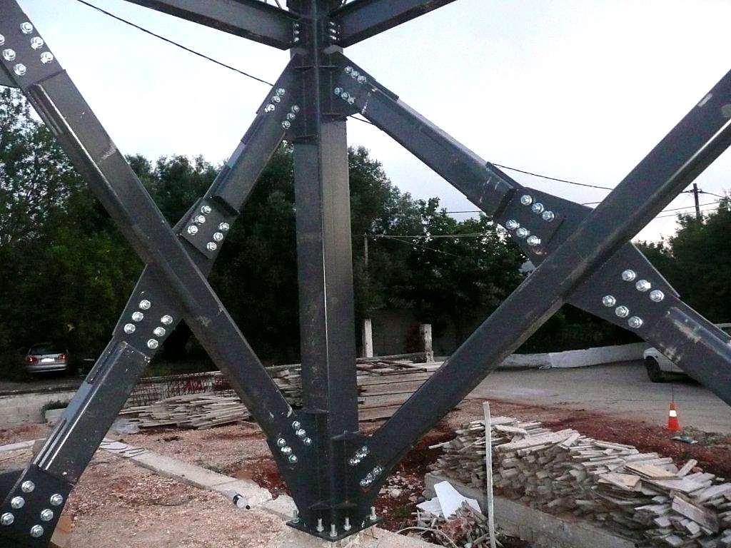 Bolted cross bracing connection at a steel column, building in Razata, Kefalonia