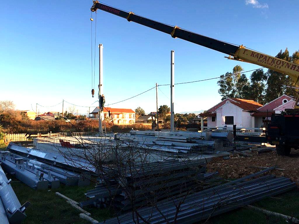 Steel members on site and the first columns of a steel-frame hotel in Sidari, Corfu