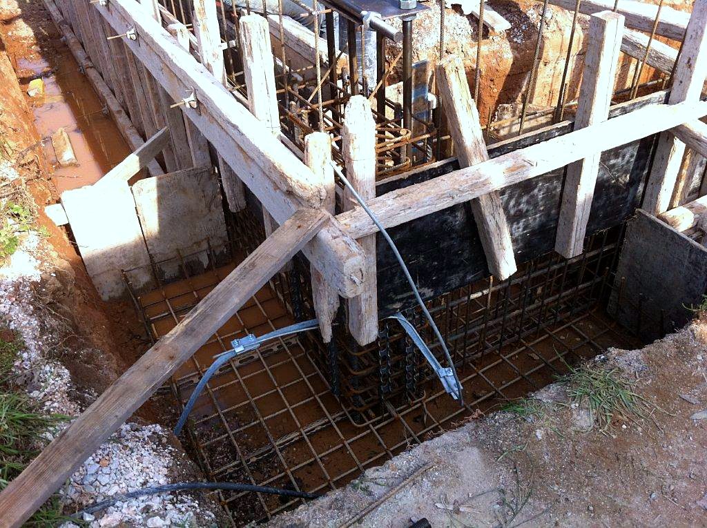 Footing rebar inside formwork, storage shed in Metamorfosi, Attica