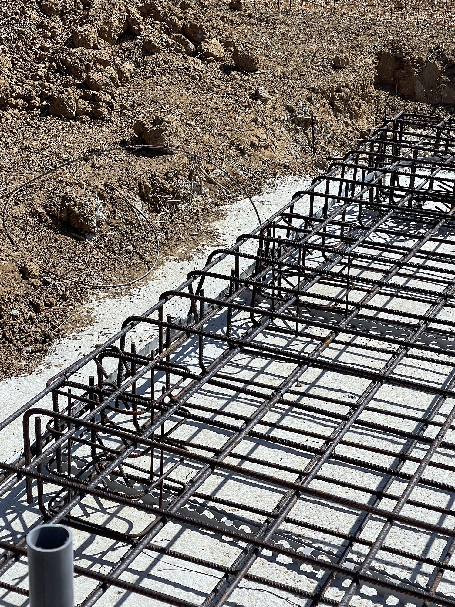 Strip footing rebar for steel-frame rental rooms on Skyros, Evia